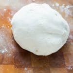 A simple every day homemade pizza dough that comes together with just a few ingredients and is ready in an hour! Plus as an added bonus, this dough freezes perfectly!!!