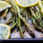 This Lemon Parmesan Asparagus is the perfect side dish for any entree! It is crispy, savory and delicious, best of all it is ideal for a quick and easy weeknight veggie as it comes together in two minutes and and roasts up in only seven minutes!