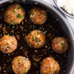 These fun and easy spicy Asian meatballs are juicy, tangy and spicy! They are baked right in the oven and dipped in an uber flavorful glaze to create the perfect party appetizer or a quick dinner!!!