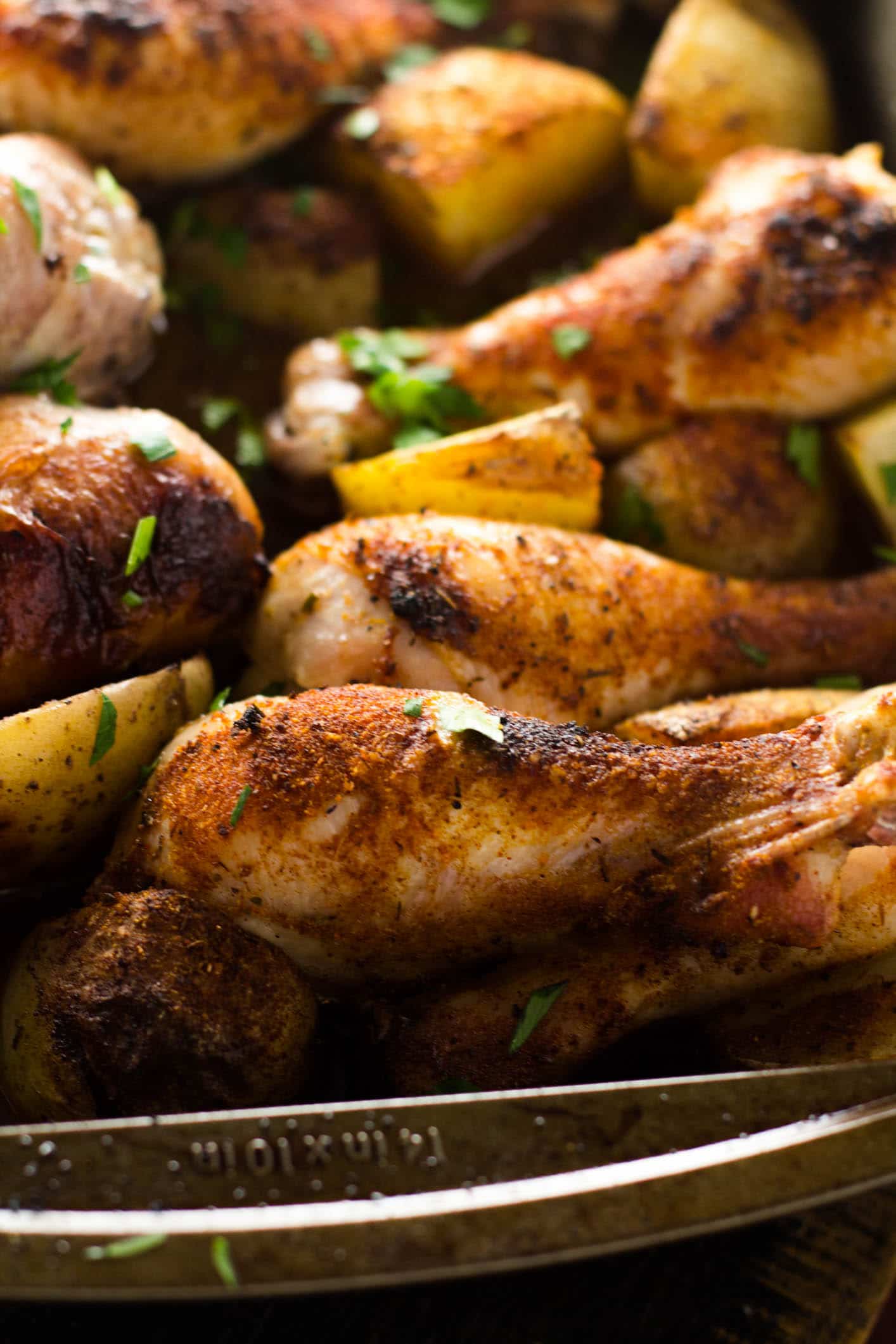 https://girlandthekitchen.com/wp-content/uploads/2014/11/Wine-Roasted-Cajun-Chicken-Thighs-and-Potatoes-7-of-7.jpg