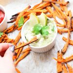 Learn how to make baked sweet potato fries that are super crispy, spicy and perfectly dipped in a healthy aioli!