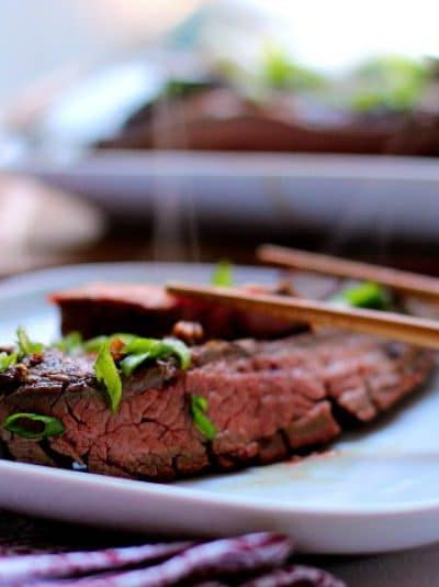 My Asian Style Grilled and Marinated Flank Steak is full of flavor, texture and that mmmmmm savory umami balance on your palate that makes you beg for more and more.