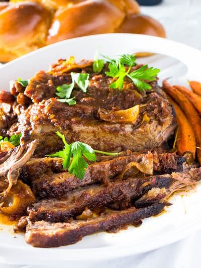 A simple and mouthwatering oven cooked brisket that is truly fuss free! Delicious, tender and freezer encouraged!!! This is the ULITMATE crowd pleaser! This is part of my perfect high holiday meal! With plenty of make ahead and freeze options...your dinner table this year will be a breeze!