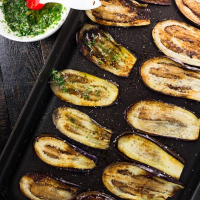 This incredibly easy and delicious eggplant recipe comes together in only 15 minutes! Thinly sliced eggplant is smeared with garlic and herbs after it has been delicately pan fried. q