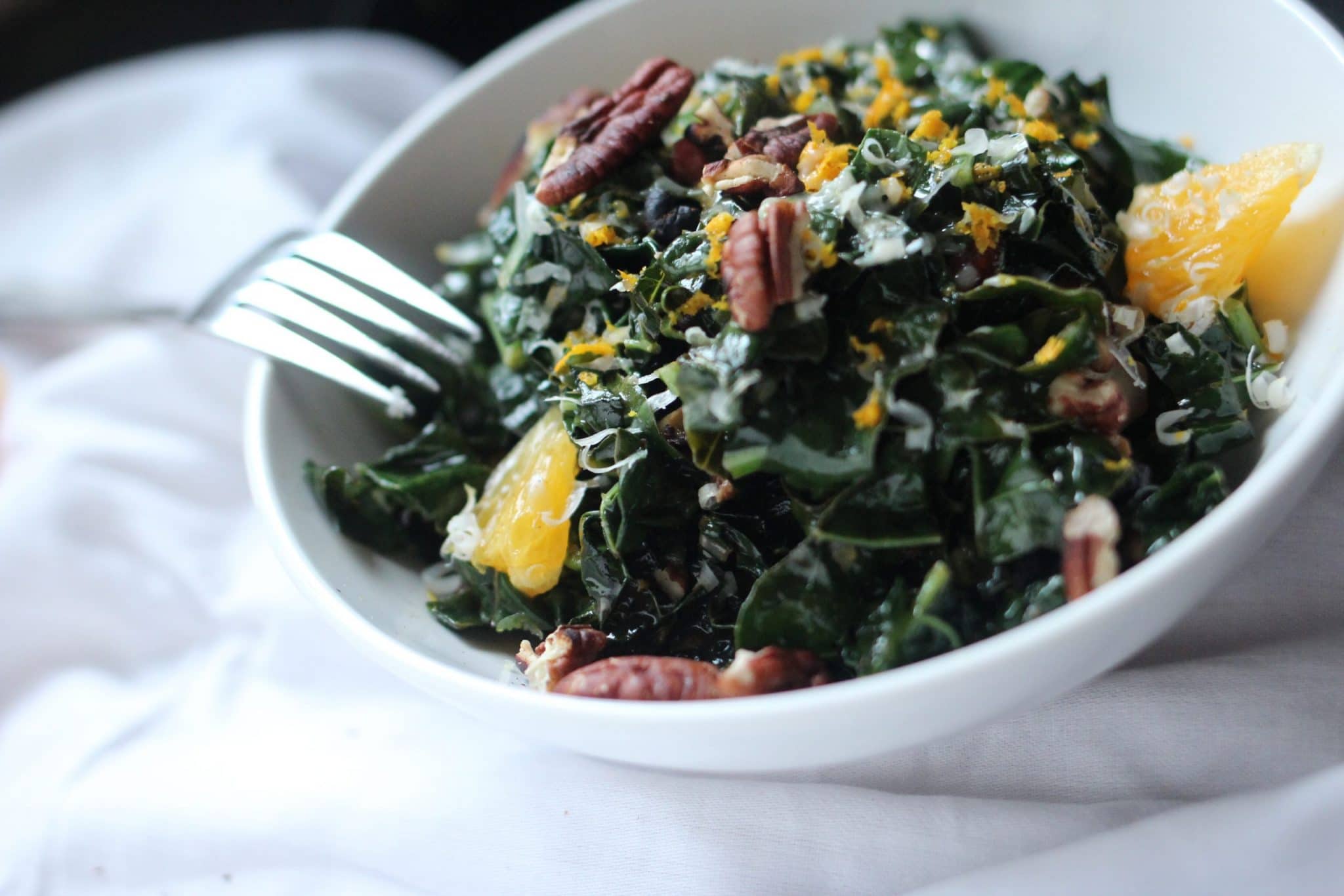 Warm Tuscan Kale Salad with Garlic Chips, Oranges and Pecans Girl and