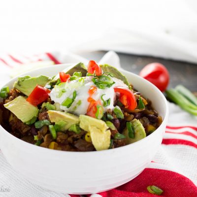 This vegetarian chili will knock your socks off! A complete and uber flavorful meal in one bowl full of protein and good for you veggies! This chili tastes so good you will never miss the meat!