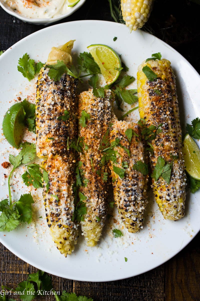 Sweet, tender and spicy! These Mexican Street Corn is all of it! It is full of vibrant colors and bold flavors and will turn your summer BBQ into a fiesta! Of course the best part is how incredibly easy it is to turn regular grilled corn into the show stopper that this Mexican Street Corn is!