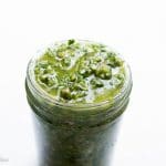 My 5 minute chimichurri sauce has a secret ingredient that sets it apart from the rest! It comes together in just a few minutes with a couple of pulses in the food processor. This sauce packs loads of garlicky flavor and is a perfect sauce, marinade and dip for just about anything!
