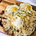 This simple 15 minute breakfast pizza boasts a super crispy potato crust, salty, melted cheeses and runny eggs. Breakfast has never been faster or more delicious! I've got a few simple tips for you that will make this pizza your breakfast go to!