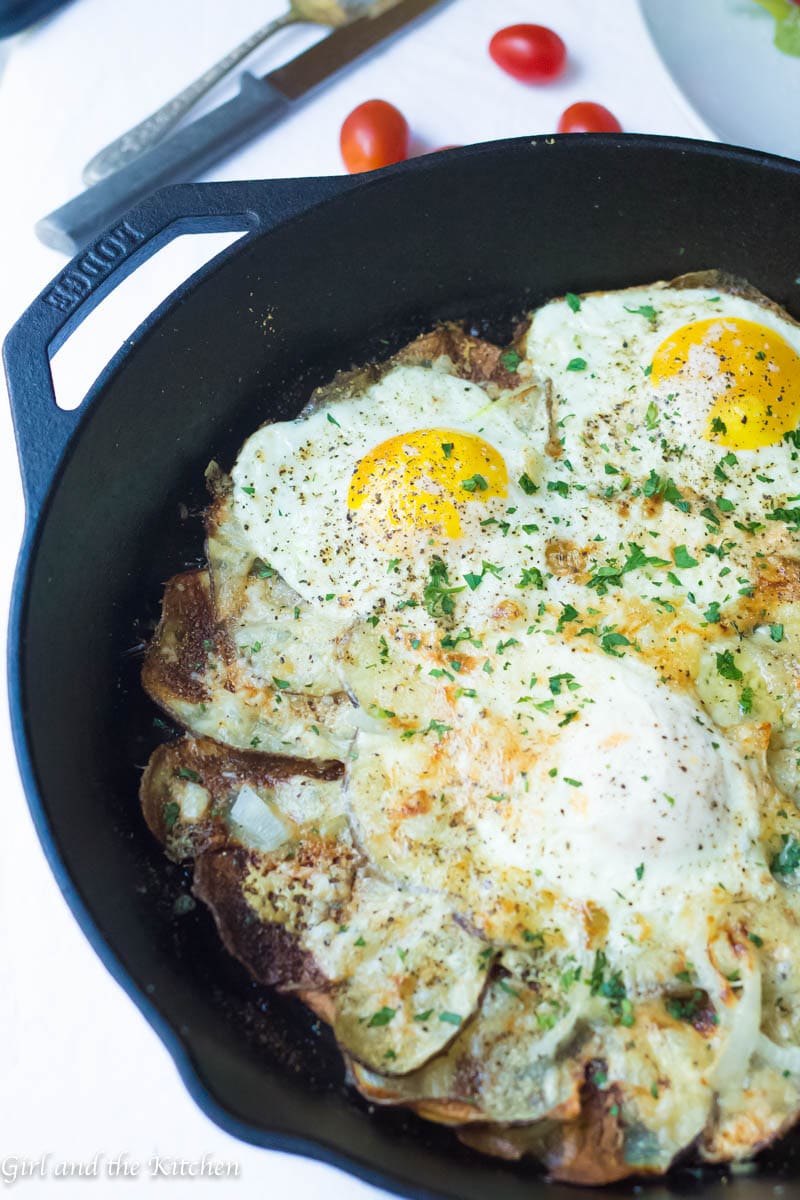 This simple 15 minute gluten free breakfast pizza boasts a super crispy potato crust, salty, melted cheeses and runny eggs. Breakfast has never been faster or more delicious! 