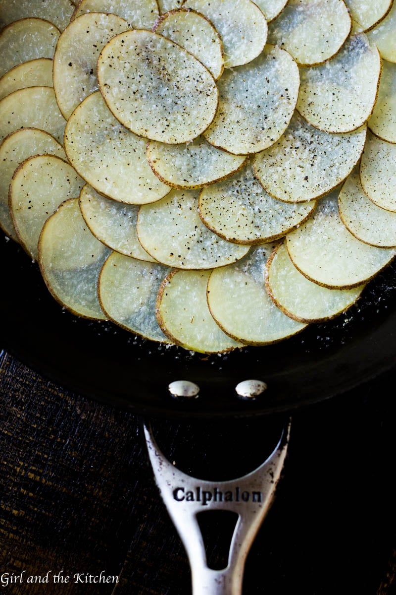 This simple 15 minute gluten free breakfast pizza boasts a super crispy potato crust, salty, melted cheeses and runny eggs. Breakfast has never been faster or more delicious! 