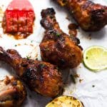 The ultimate BBQ chicken is slightly tangy and sticky sweet. Learn the restaurant secrets to cooking perfectly tender BBQ chicken and how to make a gloriously sweet and spicy sauce to mop on top of it.