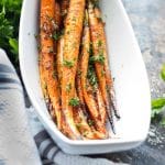 These roasted carrots are glazed with a nutty brown butter that is loaded with garlic and red pepper flakes. This easy side dish ends the age old problem of boring vegetables.