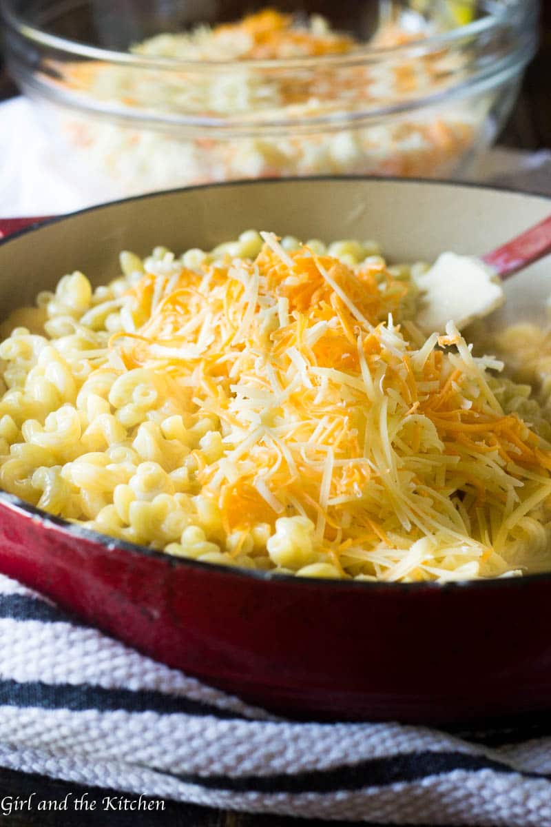 Super creamy mac and cheese made in one pot is only 20 minutes away! Loaded with three different cheeses and made right on the stove top, this easy version of an American favorite will be your favorite dinner side dish!