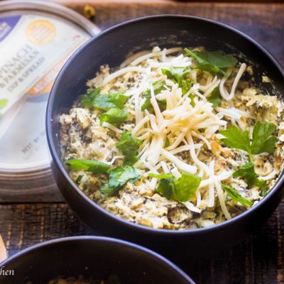 This incredible crock pot spinach and artichoke dip features 2 different dip in one crockpot with zero mess. With the aid of my simple trick you can turn one crockpot into 2 and make 2 completely different dips! I made things super simple by using La Terra Fina Artichoke Dips and had a buffalo chicken dip and a garlic spinach artichoke dip done in 90 minutes without dirtying up any dishes.
