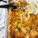 These cheesy, dreamy potatoes are the ultimate potato casserole. Layers of thinly sliced potatoes, cheese, garlic and herbs make this super simple potato dish a winner for any occasion. The best part is there is about 15 minutes of active prep and this dish can be made days ahead of time! Total wins all around!