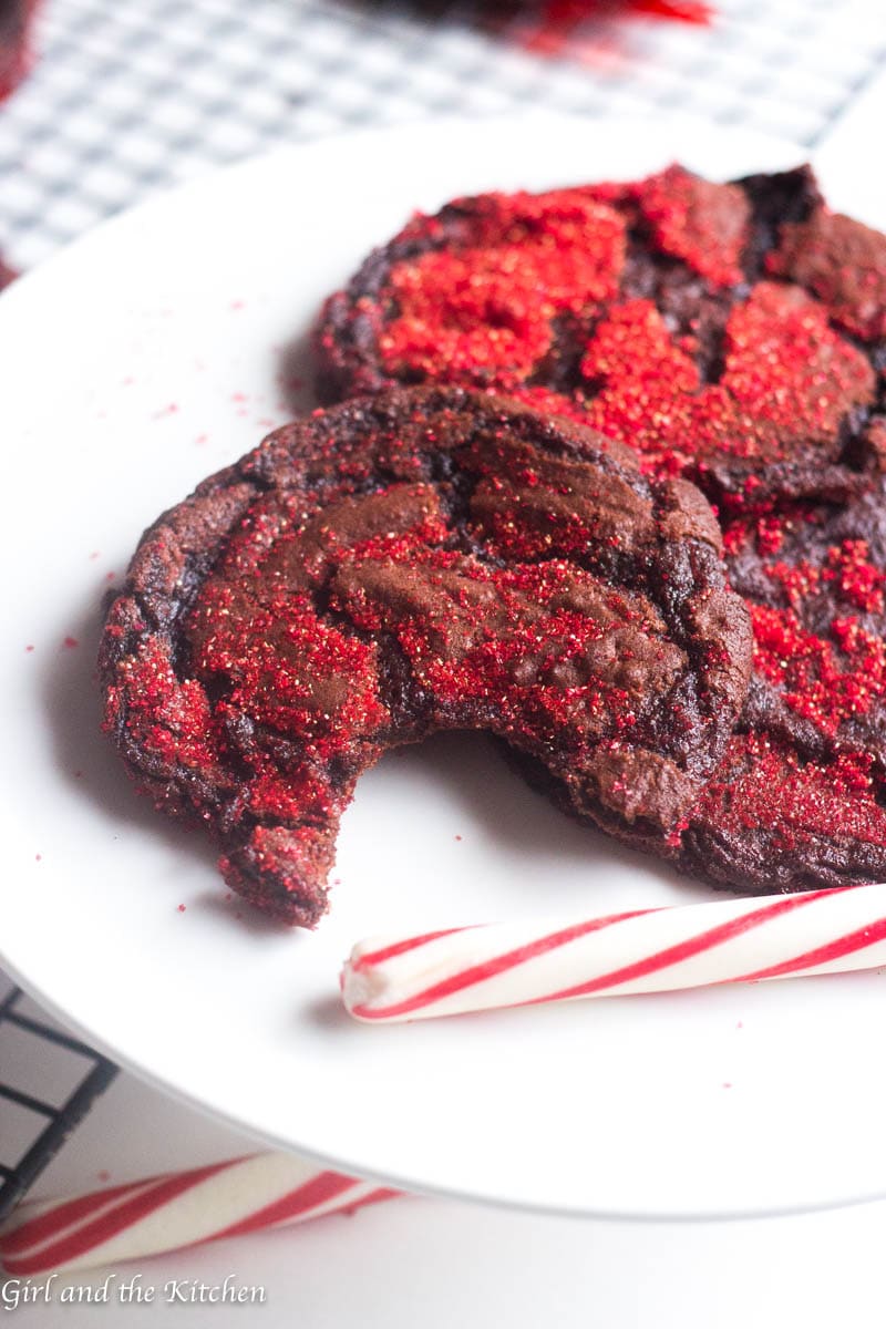 Meet the one bowl Chocolate Nutella Cookies that is a cinch to make but dazzles everyone! It is the ultimate holiday cookie filled with chocolate and Nutella. Gorgeous sparkles and delicate crinkles make this cookie a show stopper for any holiday that needs a bit of dazzle