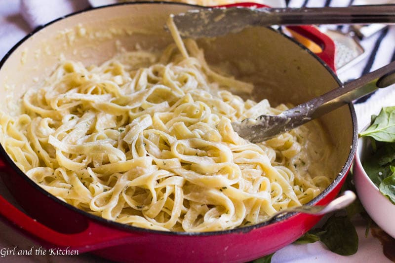 Learn how to make Fettuccine Alfredo that is not swimming in a greasy sauce and comes together in only 30 minutes but tastes like it has been simmering away all day. My version of the classic Italian American pasta is super simple and is brought to flavor perfection with just a few easy tips from a an Italian chef.