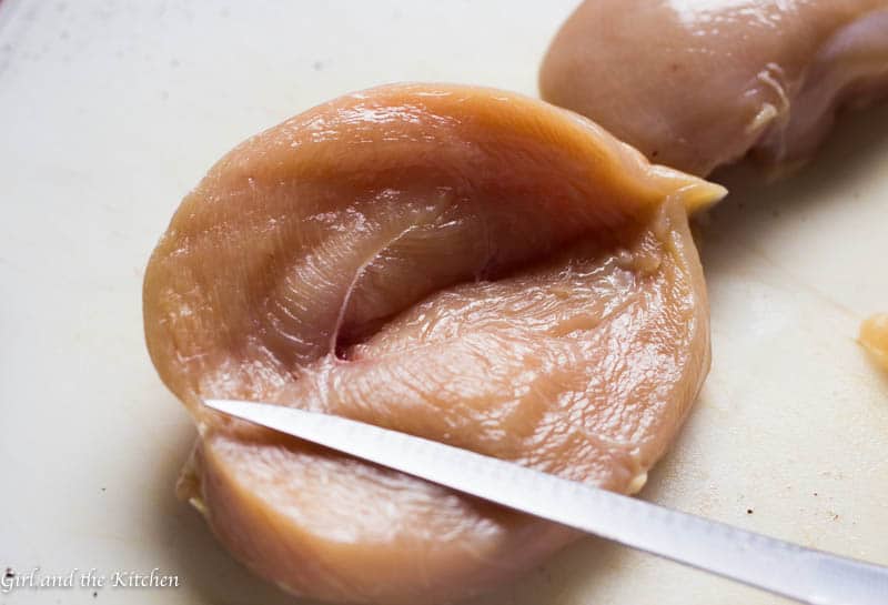 This Caprese Stuffed Chicken Breast is my solution when I want dinner on the table fast. Marinaded in a delicious balsamic dressing and stuffed with a sun-dried tomato mayonnaise, fresh mozzarella and plenty of basil, this super fast meal will leave everyone at the table asking for seconds!