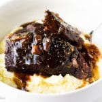 This super simple recipe for how to make Instapot short ribs will save your life! Super tender short ribs with a delicious red wine and balsamic sauce will steal the show at any dinner table yet they are simple enough to make for a Monday dinner!