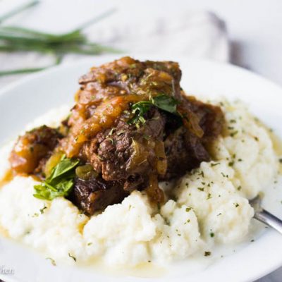This ridiculously tender Instant Pot Pot Roast is made with only 3 ingredients but is loaded with flavor! Tender meat is surrounded by a luxurious sauce! Perfect for a Sunday dinner but easy and fast enough for Monday nights!