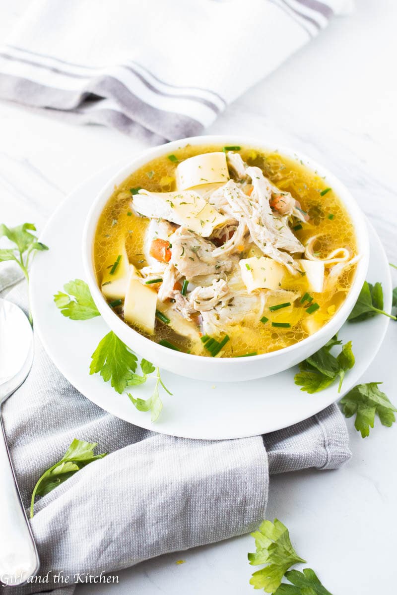 Learn how to make instant pot chicken soup with this delicious guide!  The recipe is absurdly simple yet  filled with loads of hearty flavor all with the added bonus of a one pot meal!