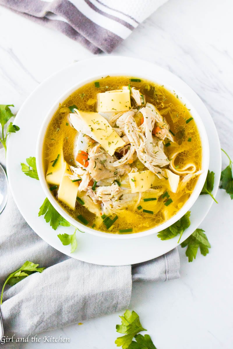 Learn how to make instant pot chicken soup with this delicious guide!  The recipe is absurdly simple yet  filled with loads of hearty flavor all with the added bonus of a one pit meal!