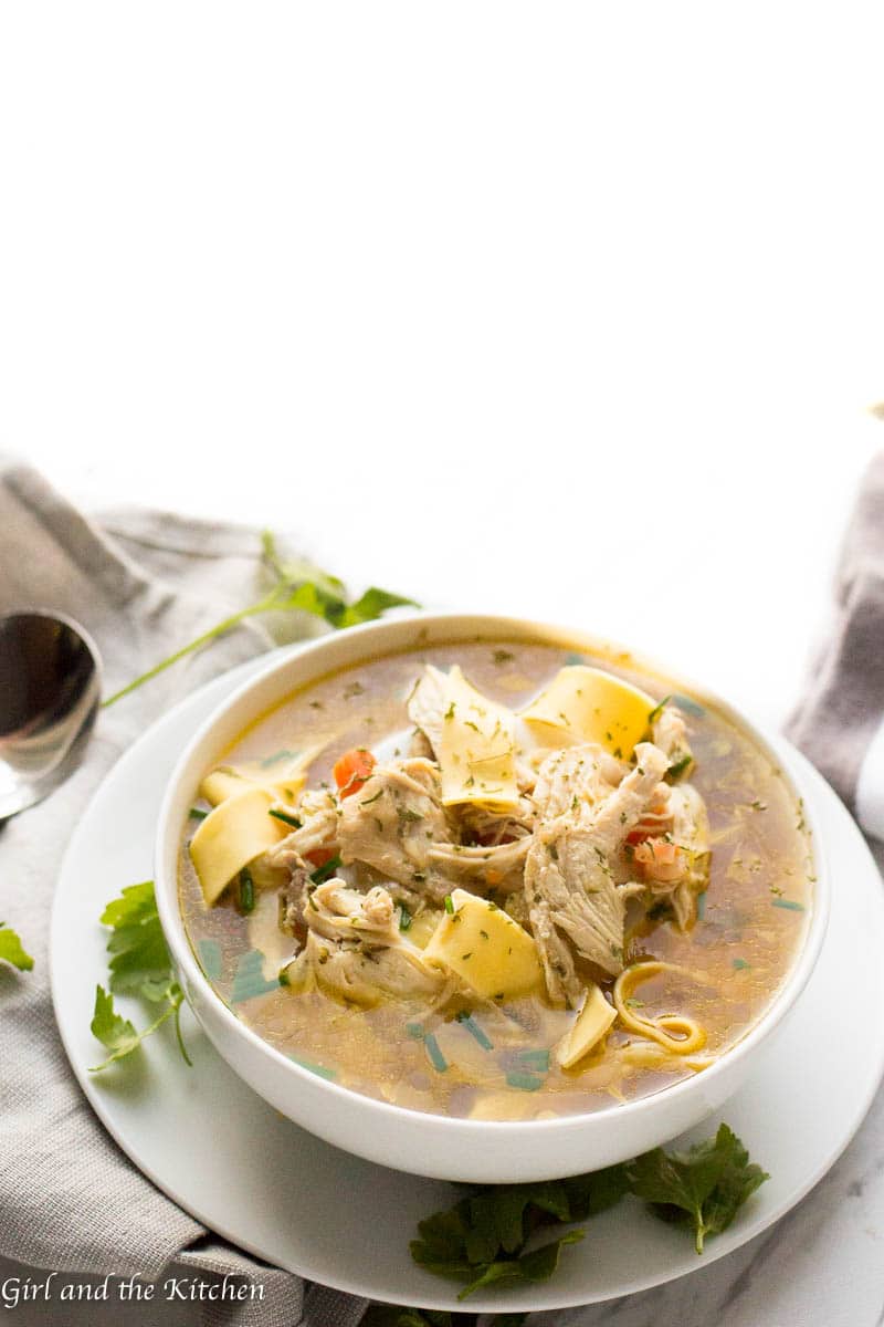 Learn how to make instant pot chicken soup with this delicious guide!  The recipe is absurdly simple yet  filled with loads of hearty flavor all with the added bonus of a one pot meal!