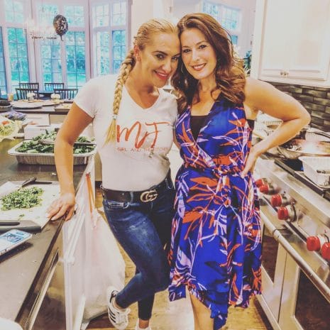 Mila with Client in a kitchen