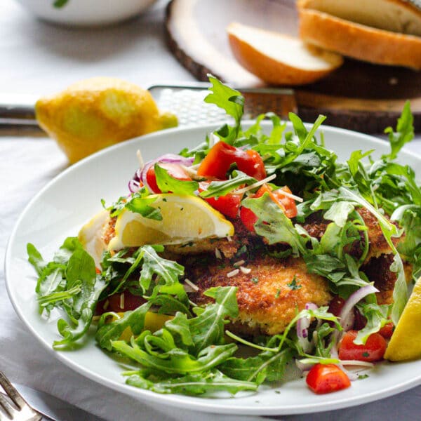 How to Make Chicken Milanese (with Arugula and Tomato Salad) - Girl and ...