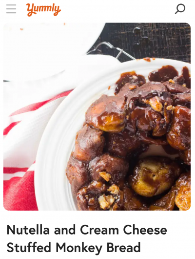 Yummly recipe title and image of a pile of Nutella and cream cheese monkey bread on a white plate